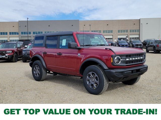 2026 Ford Bronco Big Bend in Ruby Red Metallic Tinted Clearcoat — front three-quarter view